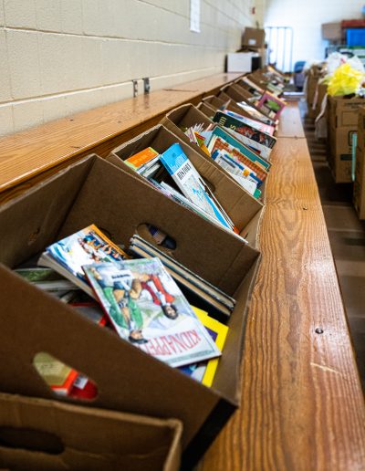 Boxes full of books lined up in Fairfield gymnasium